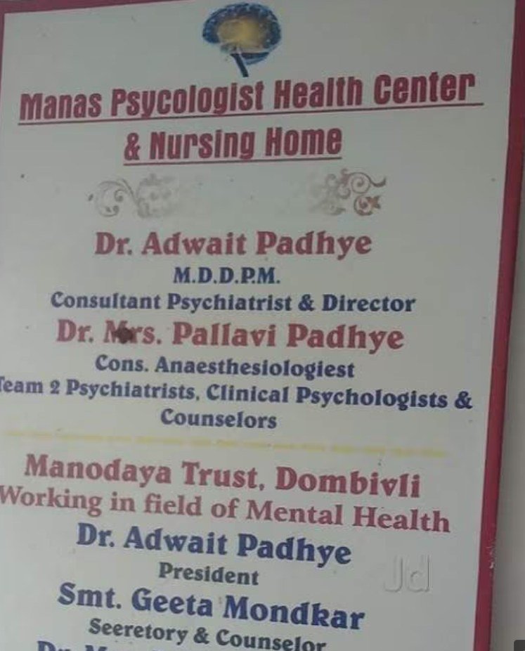 The signboard at Manas Psychological Health Centre listing the clinical team and the trustees of Manodaya Trust